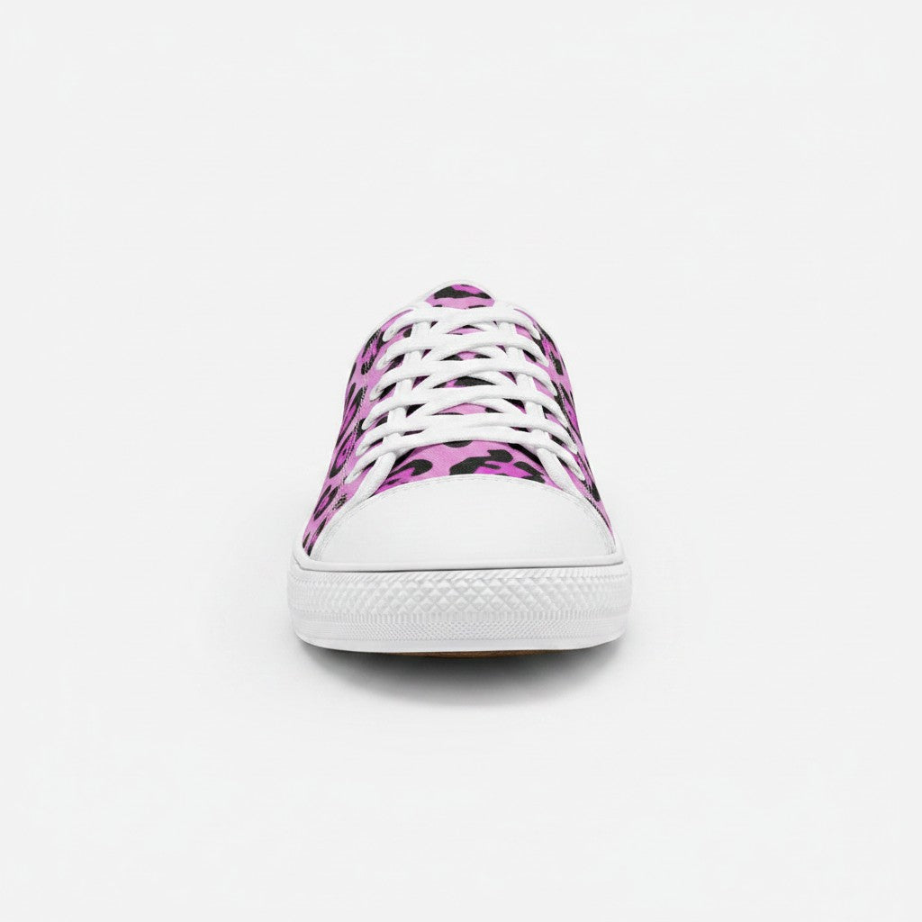 Freaky Shoes® low-top canvas sneakers featuring a vibrant pink and black animal print pattern with white laces