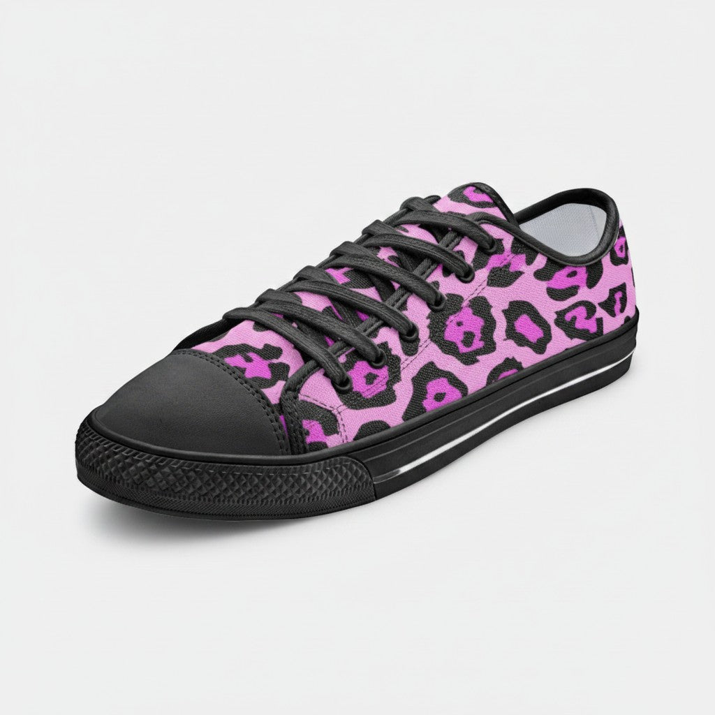 Freaky Shoes® low-top canvas sneakers featuring a vibrant pink and black leopard animal print with black laces.