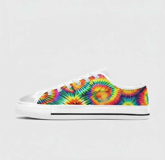 Freaky Shoes® men's low-top canvas sneakers featuring a vibrant rainbow tie-dye spiral pattern and white rubber soles.