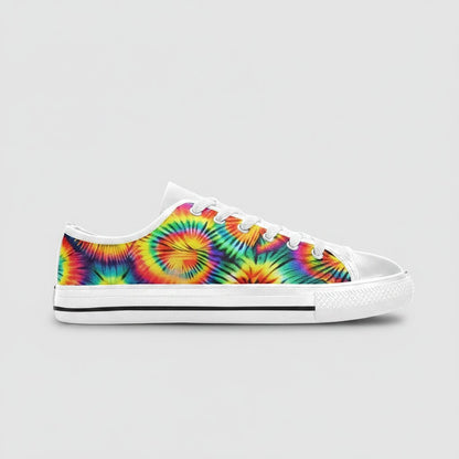 Freaky Shoes® women's low-top canvas sneakers featuring a vibrant rainbow tie-dye spiral pattern and white laces.