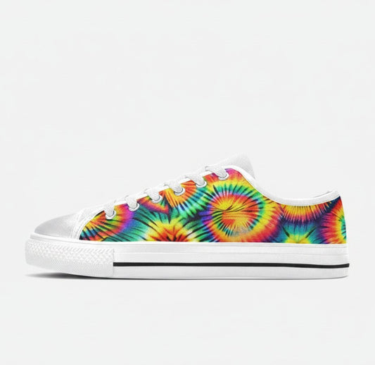 Freaky Shoes® men's low-top canvas sneakers featuring a vibrant rainbow tie-dye spiral pattern and white rubber soles.