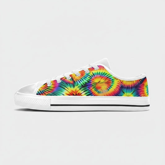 Freaky Shoes® women's low-top canvas sneakers featuring a vibrant rainbow tie-dye spiral pattern and white laces.