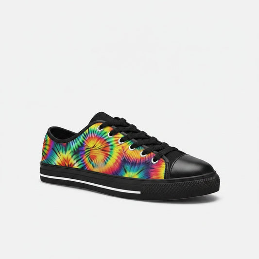 Freaky Shoes® men's low-top canvas sneakers featuring a vibrant rainbow tie-dye pattern and black trim.