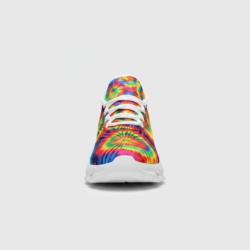 Freaky Shoes® rainbow tie dye high-top canvas sneakers with white laces and a thick white EVA sole, front view.