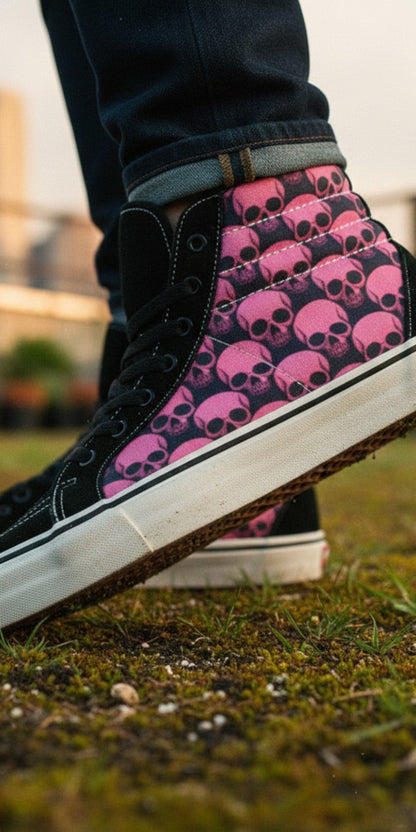 Freaky Shoes® women's high top skate sneakers featuring a pink and black underground skull comic art print.