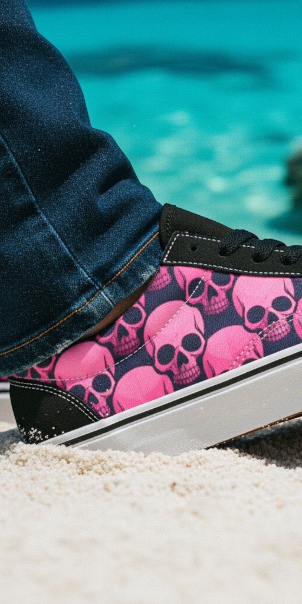 Freaky Shoes® women's low top skate sneakers featuring a pink and black underground skull comic print on sand.