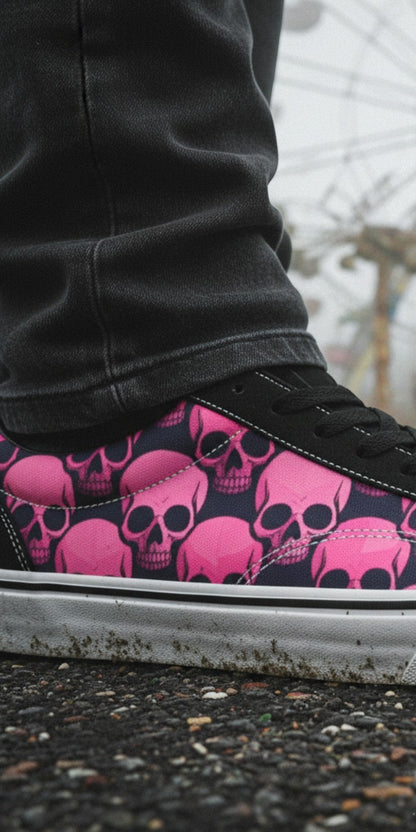 Freaky Shoes® women's low top skate sneakers featuring a pink and black skull comic print on a foggy carnival backdrop.