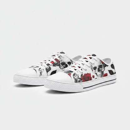 Freaky Shoes® low-top canvas sneakers featuring a detailed black and white skull and red rose print pattern.