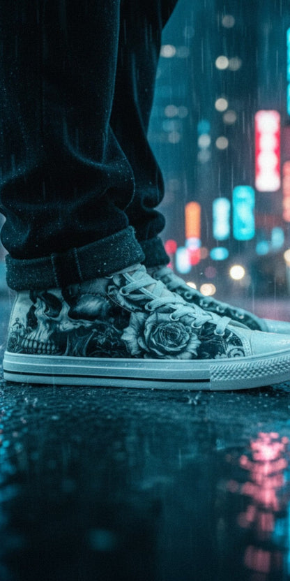 Freaky Shoes® monochrome skull and rose print canvas high top sneakers worn in a rainy city street at night.