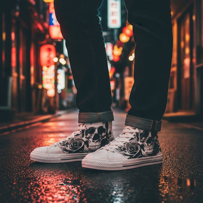 Freaky Shoes® men's high-top canvas sneakers featuring a black and white cartoon skull and rose print on a city street.