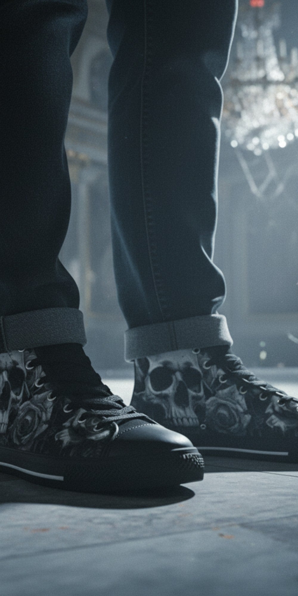 Freaky Shoes® high top canvas sneakers featuring a dark gothic grey skull and rose print, worn with cuffed jeans.