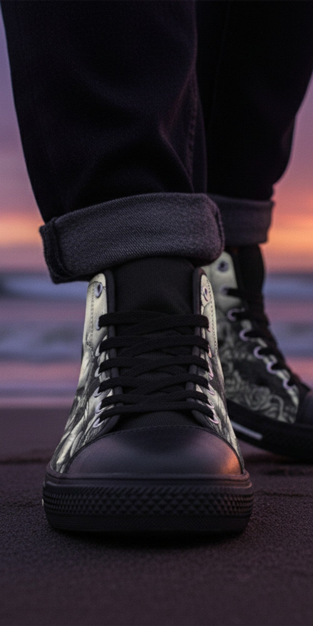 Freaky Shoes® men's high top canvas sneakers featuring a dark skull and rose art print on a beach at sunset.