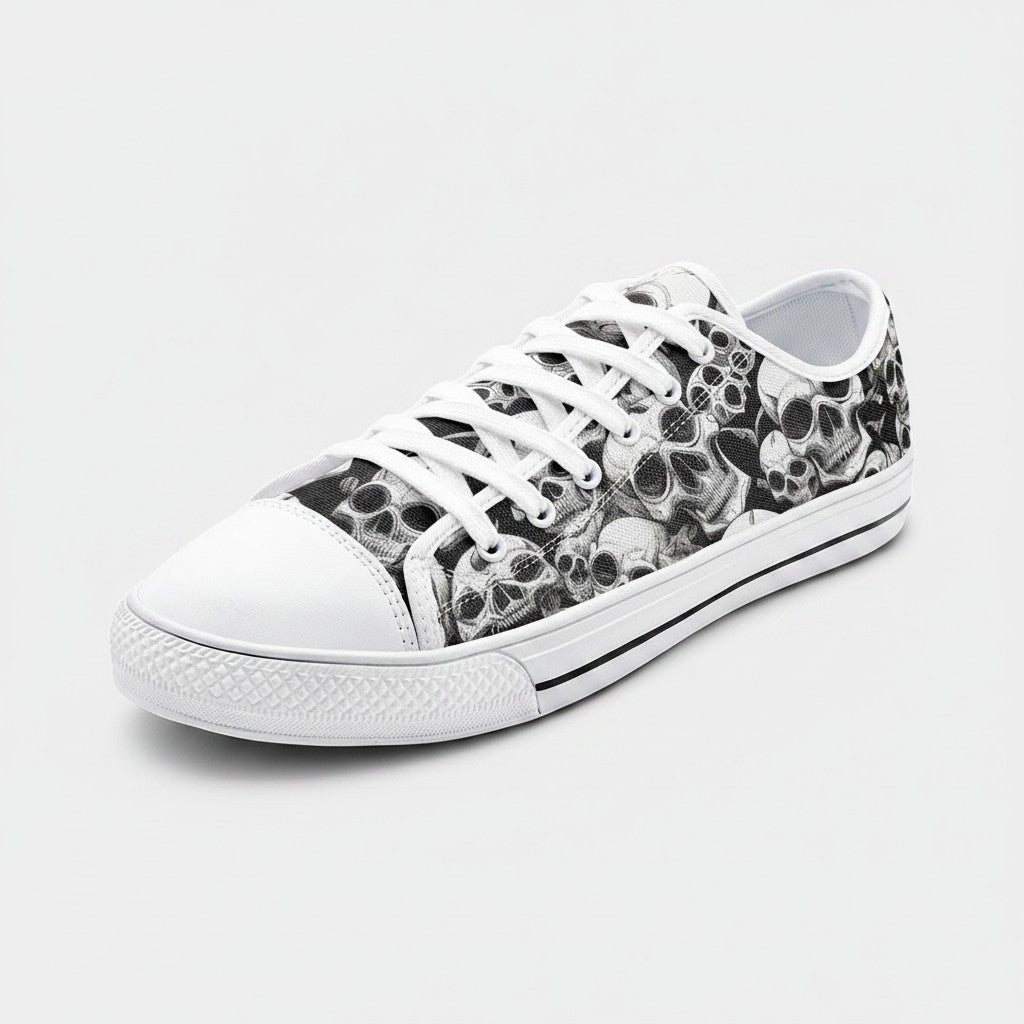 Freaky Shoes® Skulls Mania low-top canvas sneakers featuring a detailed black and white skull pattern and white laces.