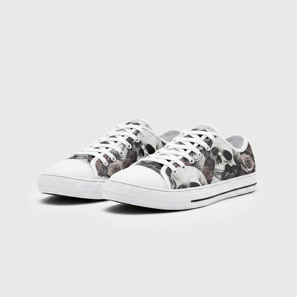 Freaky Shoes® custom low-top canvas sneakers featuring a detailed skulls and roses print with white laces and soles.