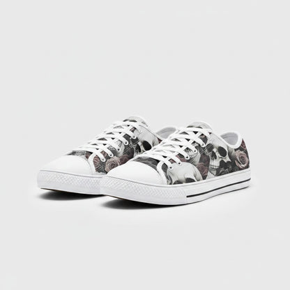 Freaky Shoes® custom low-top canvas sneakers featuring a detailed skulls and roses print with white laces and soles.