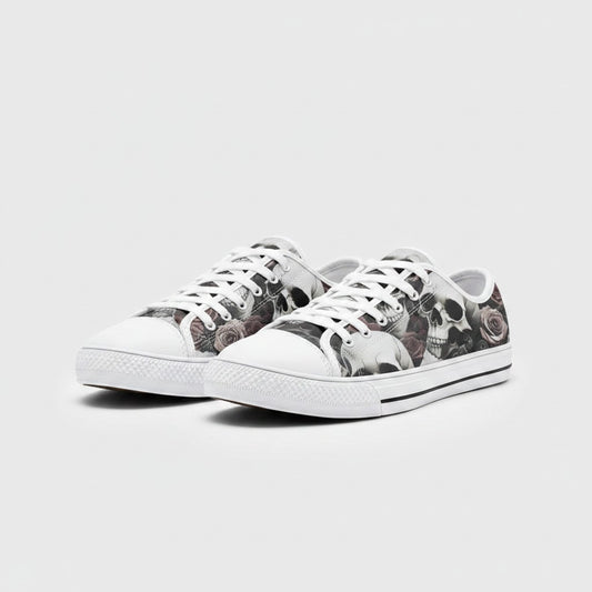 Freaky Shoes® custom low-top canvas sneakers featuring a detailed skulls and roses print with white laces and soles.