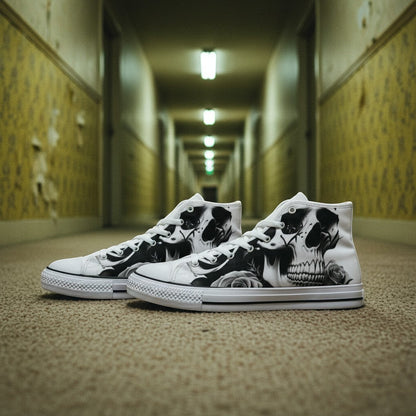 Freaky Shoes® women's high-top canvas shoes featuring a black and white skulls and roses print in a hallway setting.