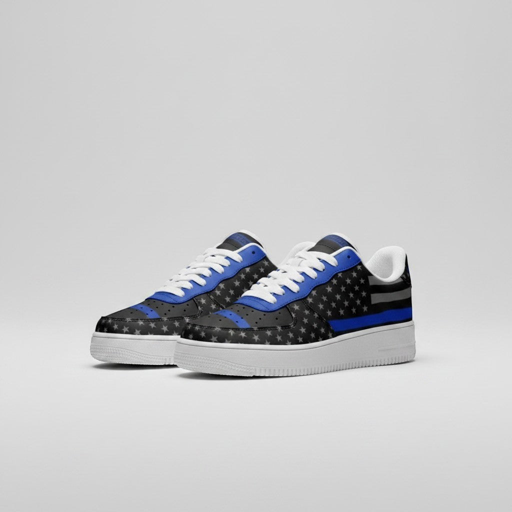 Freaky Shoes® low-top leather sneakers featuring a black and grey star pattern with a bold blue line flag design.
