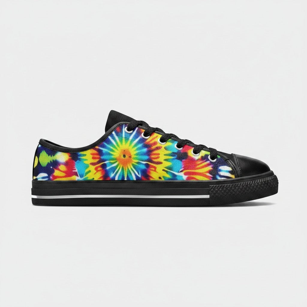 Freaky Shoes® men's low-top canvas sneakers featuring a vibrant multi-color tie-dye sunburst pattern and black trim.