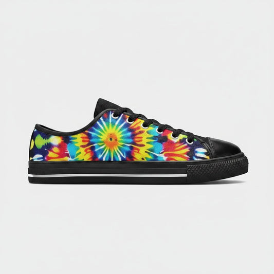 Freaky Shoes® men's low-top canvas sneakers featuring a vibrant multi-color tie-dye sunburst pattern and black trim.