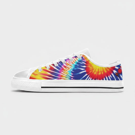 Freaky Shoes® women's low-top canvas sneakers featuring a vibrant multi-coloured tie-dye splash pattern