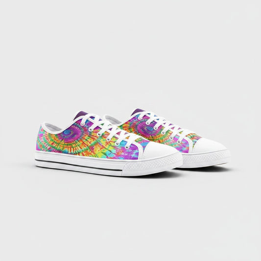 Freaky Shoes® low-top canvas sneakers featuring a vibrant, multi-colored tie-dye shatter pattern and white laces.