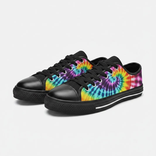 Freaky Shoes® women's low-top canvas sneakers featuring a vibrant multi-colored spiral tie-dye print and black trim.