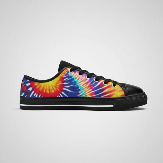 Freaky Shoes® women's low-top canvas sneakers featuring a vibrant multi-colored tie-dye splash pattern and black trim.