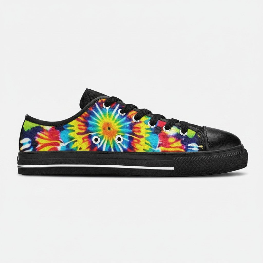 Freaky Shoes® women's low-top canvas sneakers featuring a vibrant multi-colored tie-dye pattern and black trim.