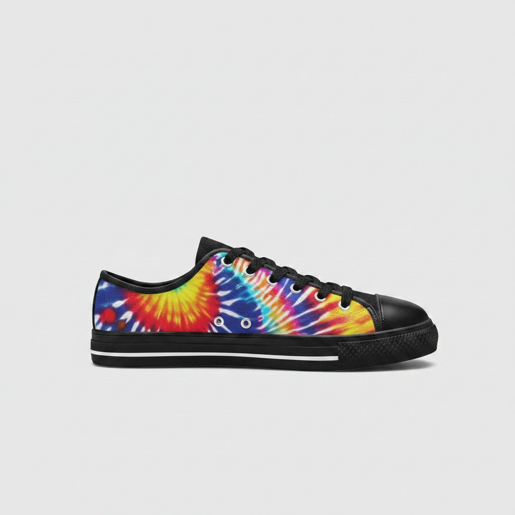 Freaky Shoes® men's low-top canvas sneakers featuring a vibrant multi-colored tie-dye splash pattern and black trim.