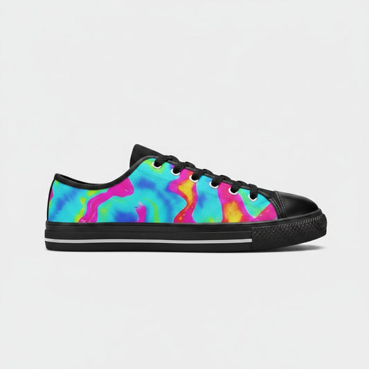 Freaky Shoes® women's low-top canvas sneakers featuring a vibrant multi-color tie-dye splash pattern and black trim.